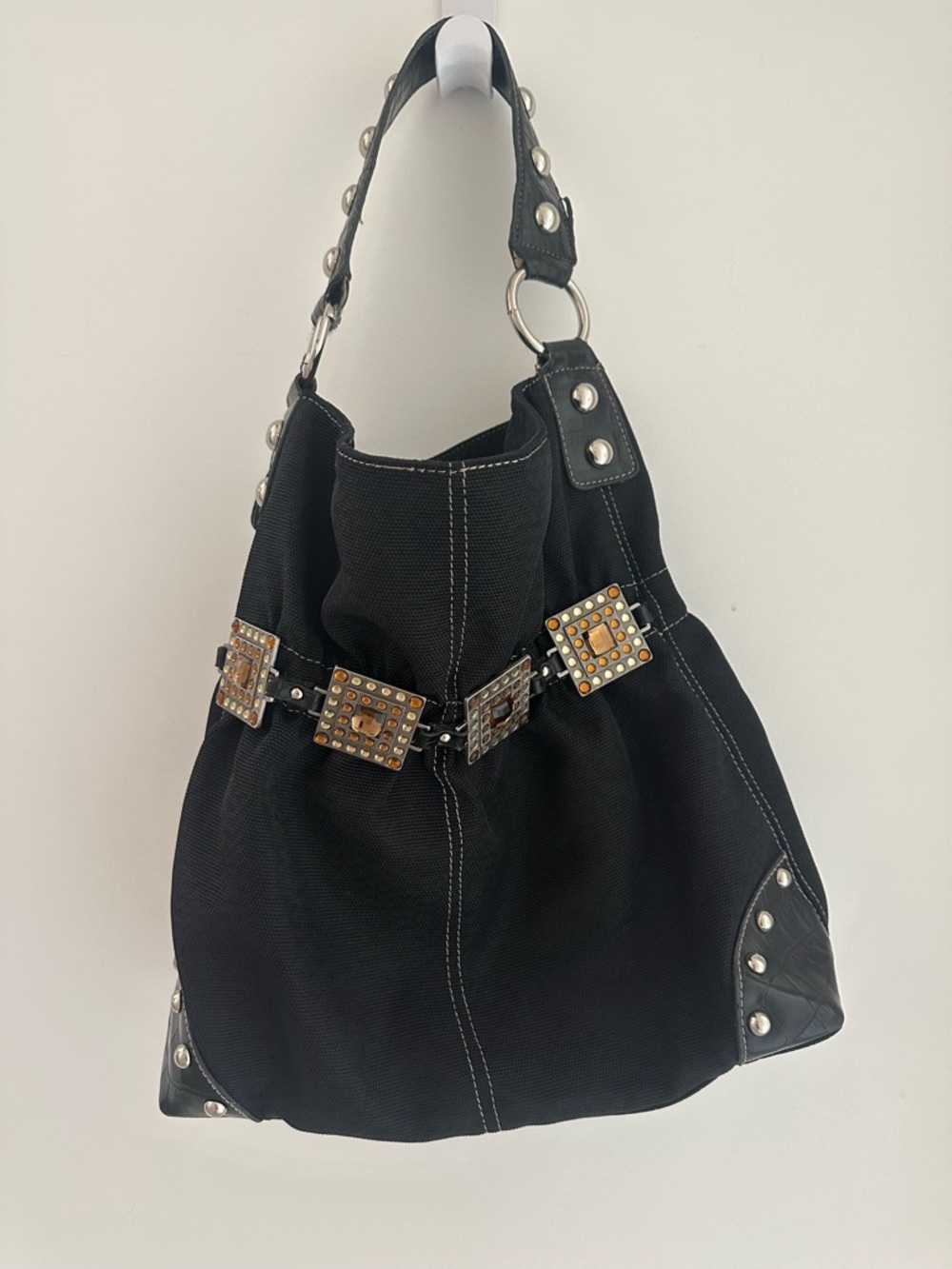Black Studded Canvas Hobo Bag with Decorative Buckles